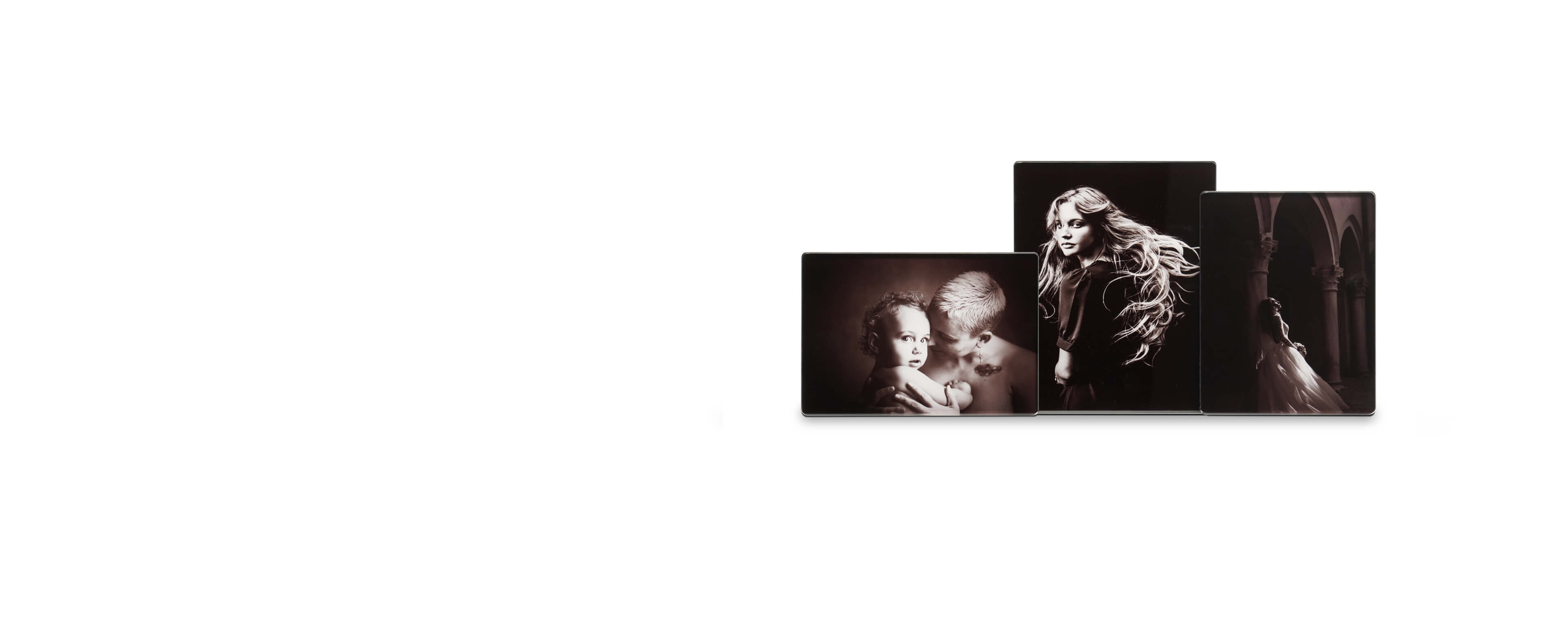 three acrylic photo plaques in different sizes