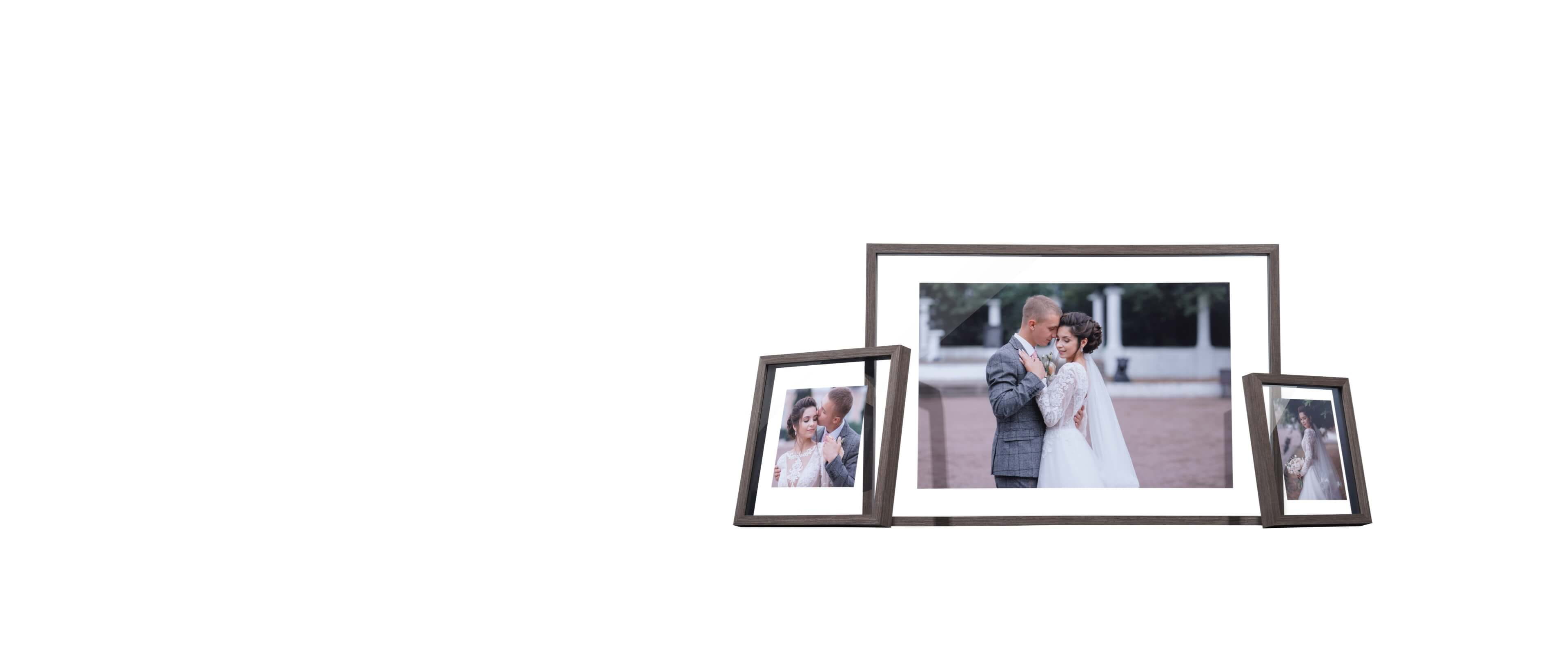 three double glass frames in different sizes showing photos of a wedding couple