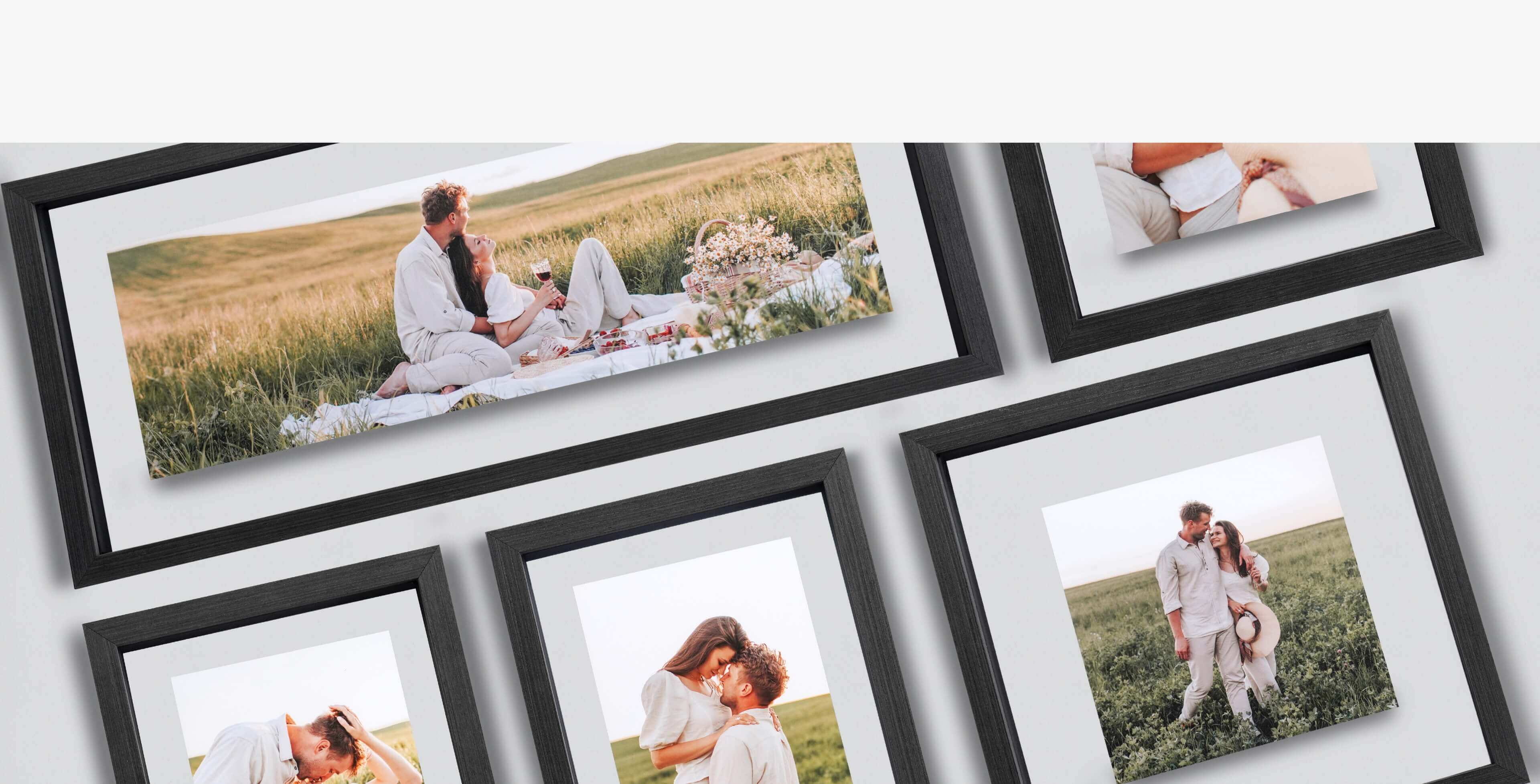 five double glass frames in different sizes showing photos of a couple