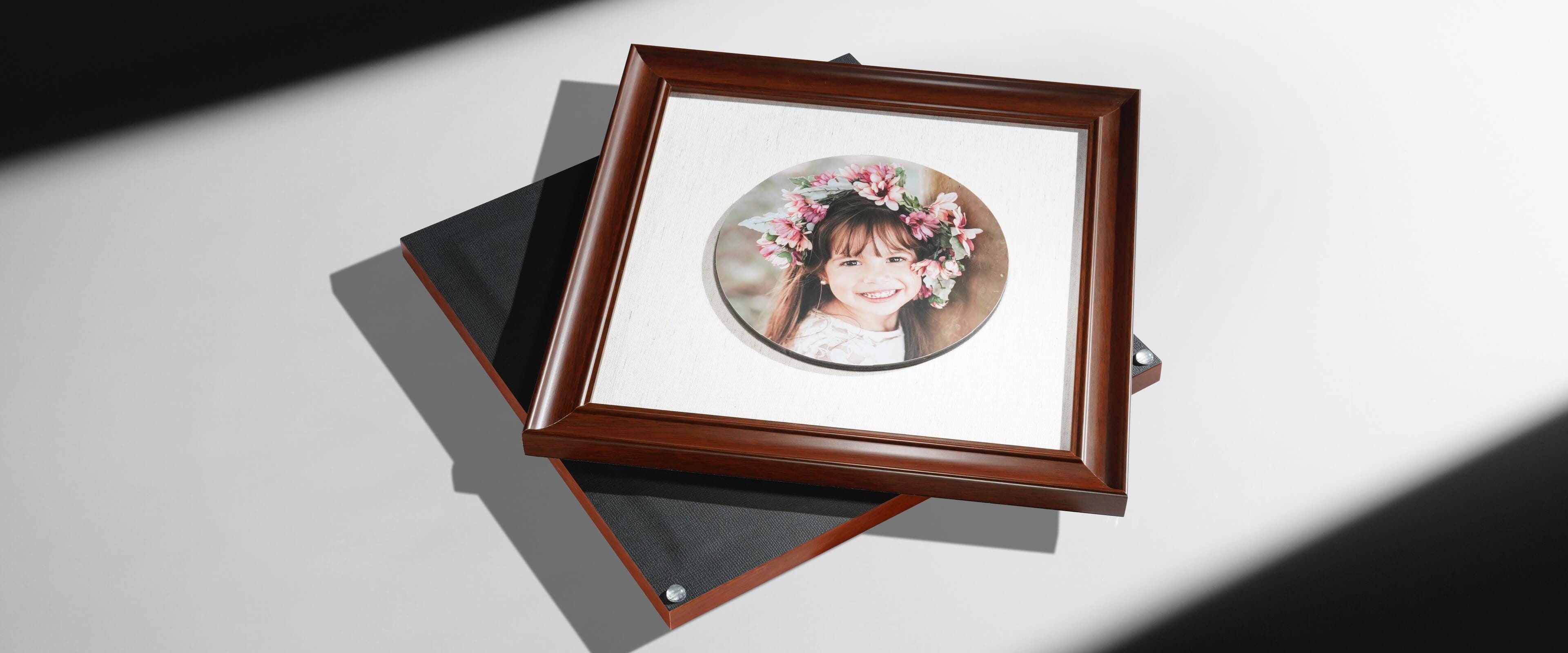 two float frames stacked on stop of each other with picture of little girl