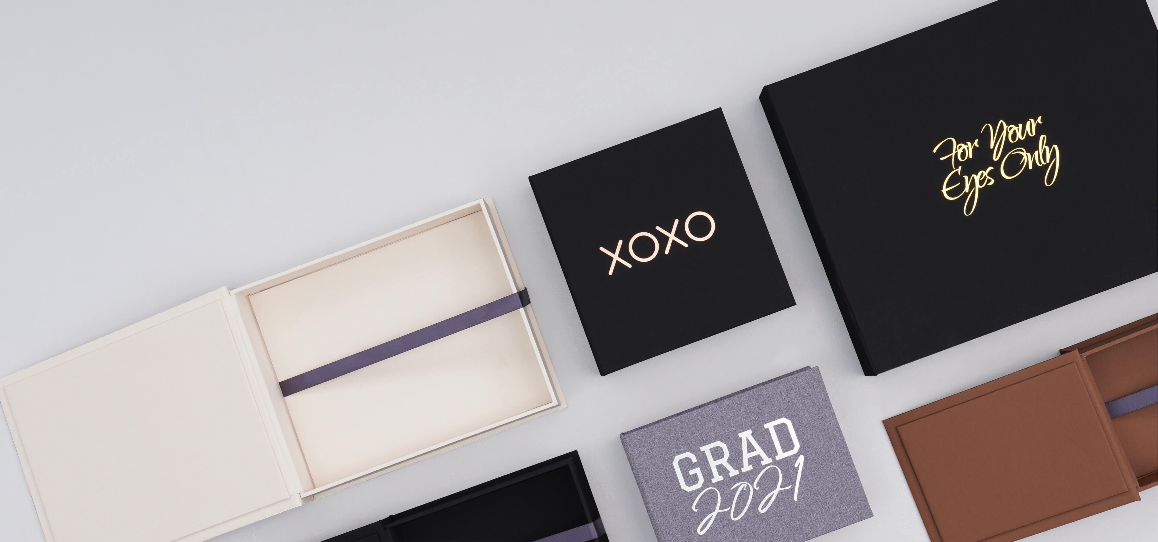 six folio boxes in different colors and sizes