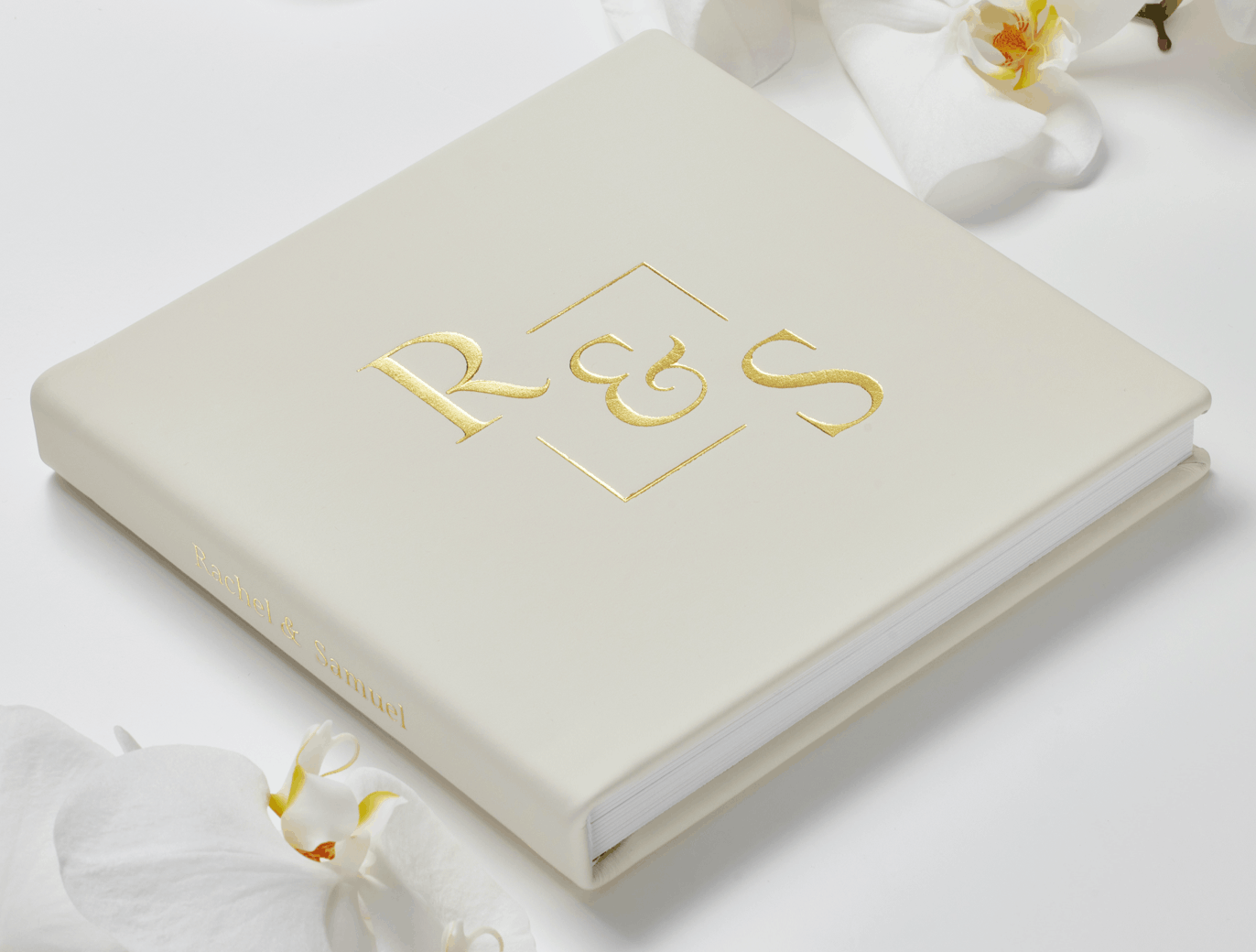 flush mount album showing a foil debossing on a white table