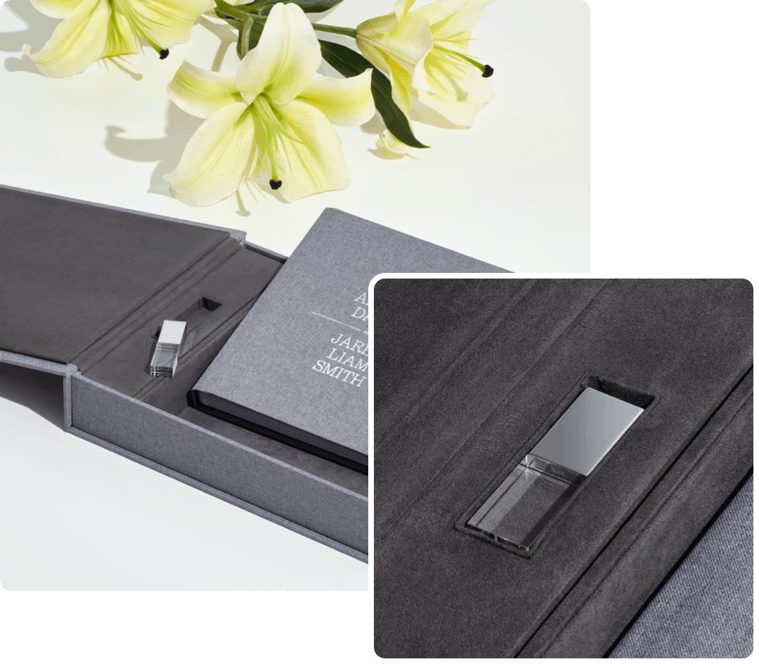 presentation box album usb set laying on a white table with one closeup photo
