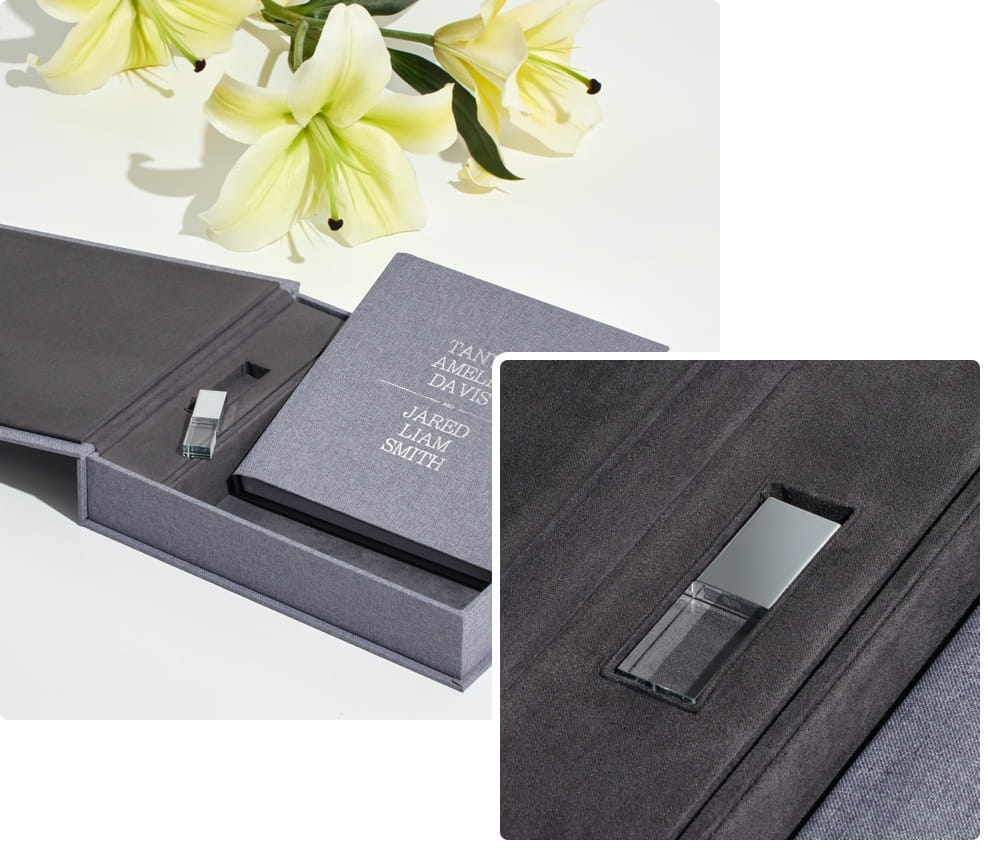presentation box album usb set laying on a white table with one closeup photo