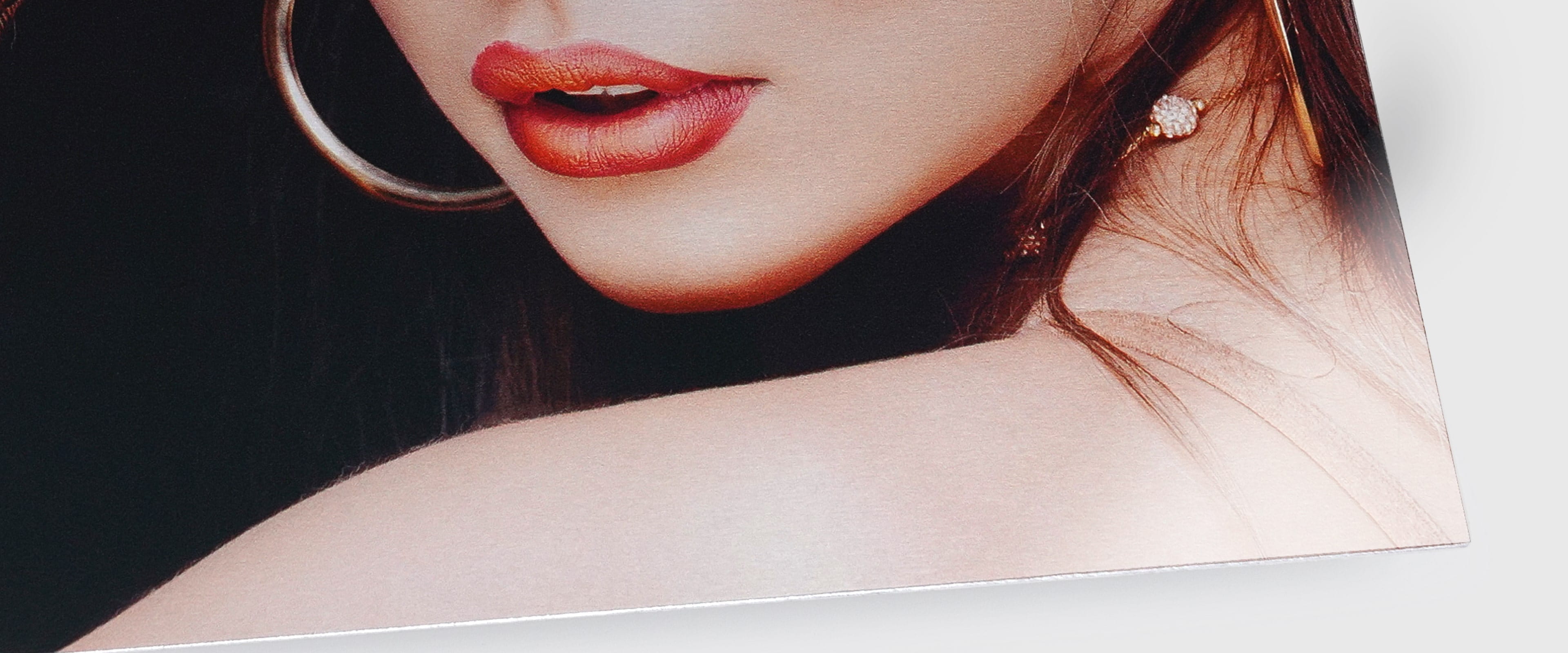 metal print showing a woman’s lips 