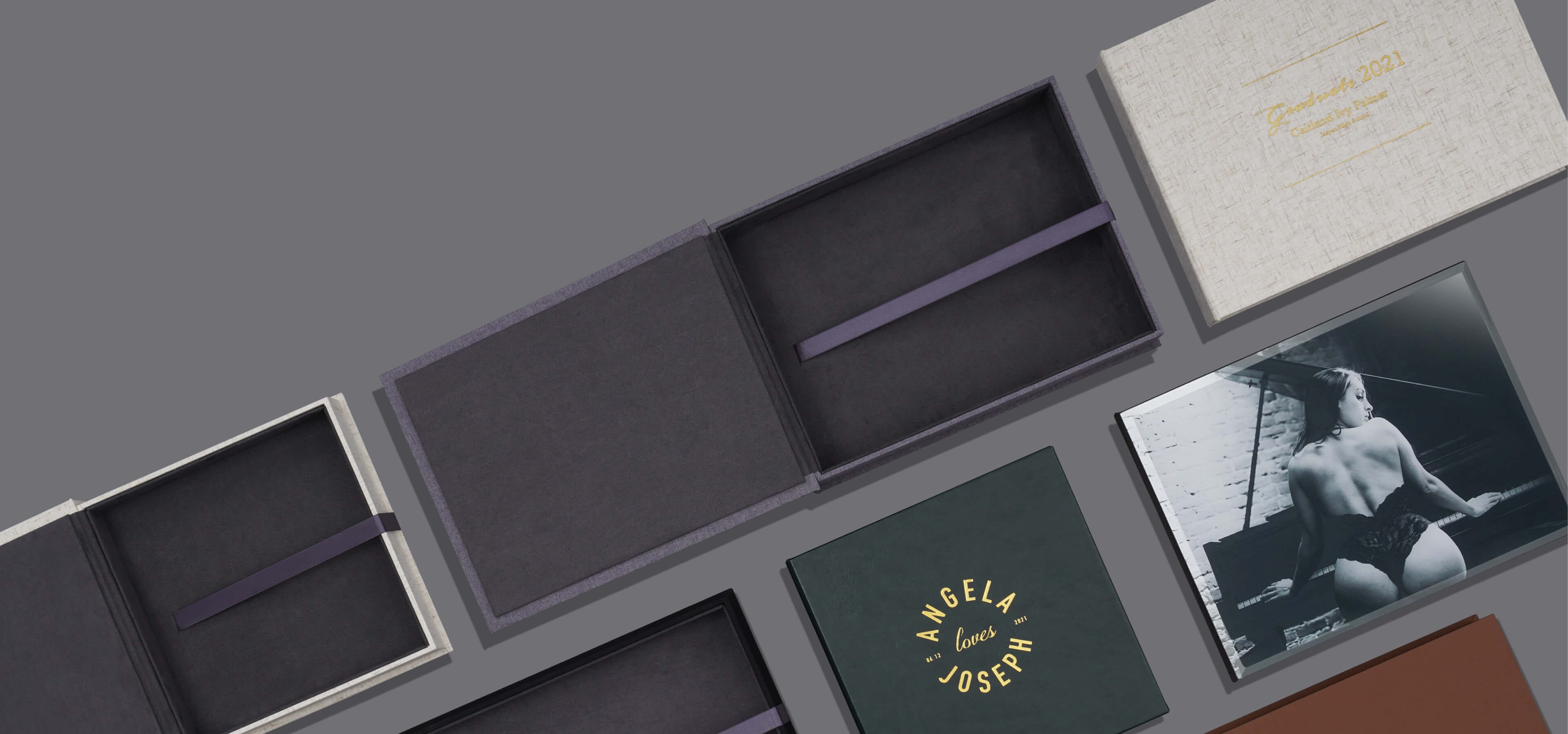 six presentation boxes on a grey background