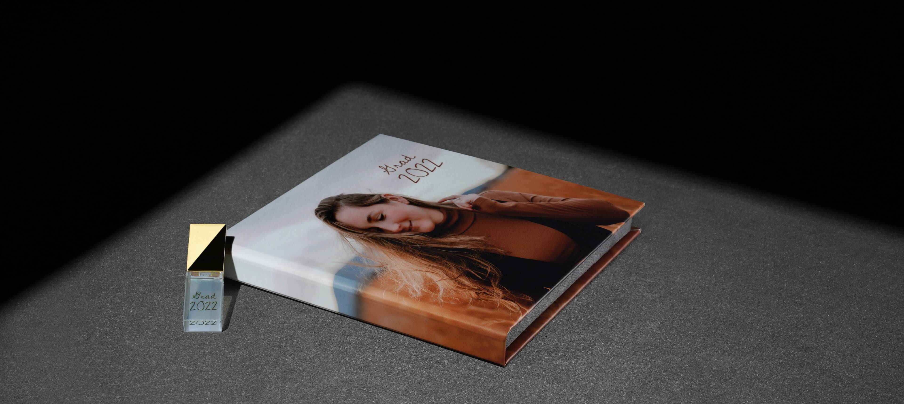 a usb case set on a grey table showing a woman in field